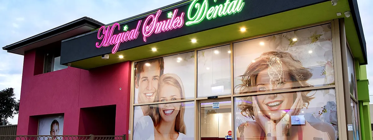 Magical Smiles Caroline Springs — sister clinic exterior with pink and green storefront and signature neon signage